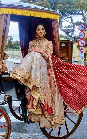 Maltese woman in a traditional Indian outfit turns heads in Mdina