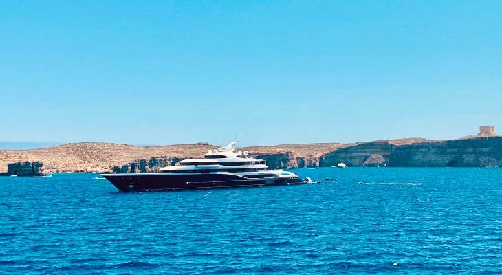 Thousands of people crossing between Gozo and Malta yesterday were wowed by the sight of a mega superyacht berthed next to Comino, and as it turns out