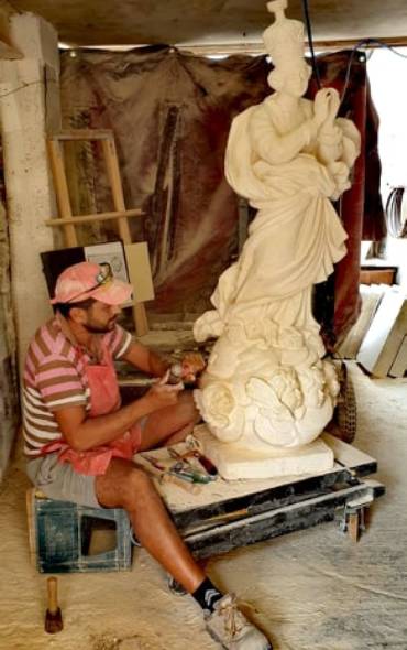 All in a year’s work! Maltese stonemason explains restoration process behind local Medieval balcony